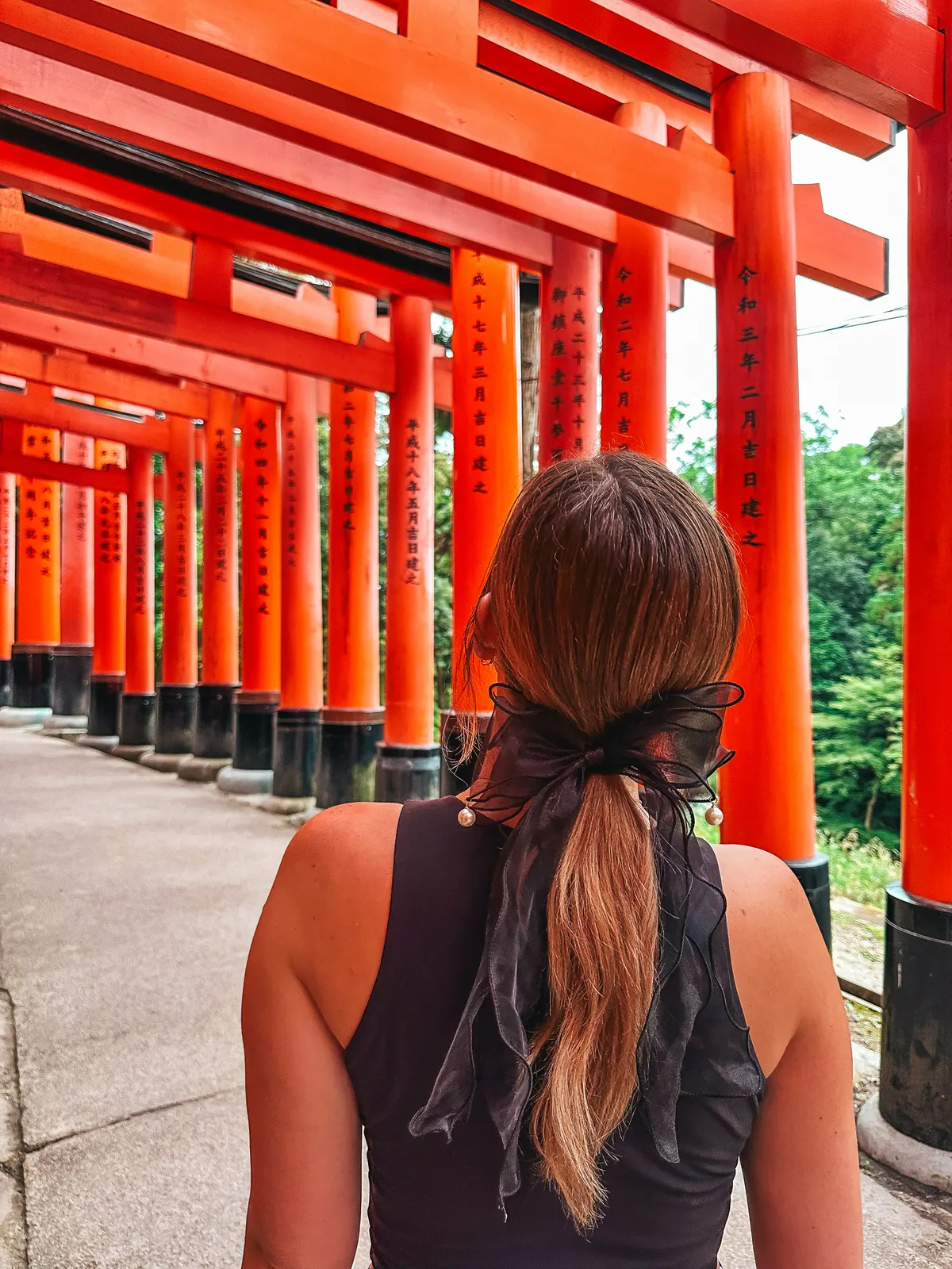 Admiring the tori gates at the Fushimi Inari Taisha Shrine in Kyoto