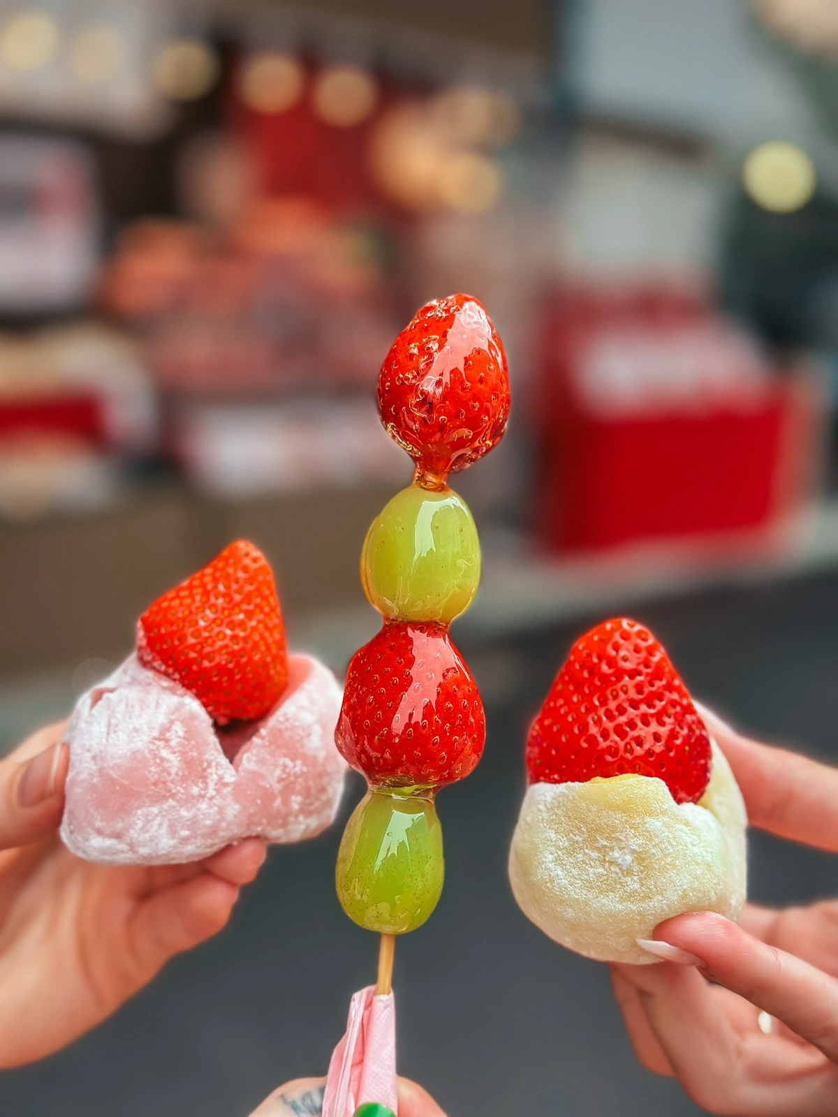 Ichigo daifuku and tanghulu at the Tsukiji Fish Market in Tokyo