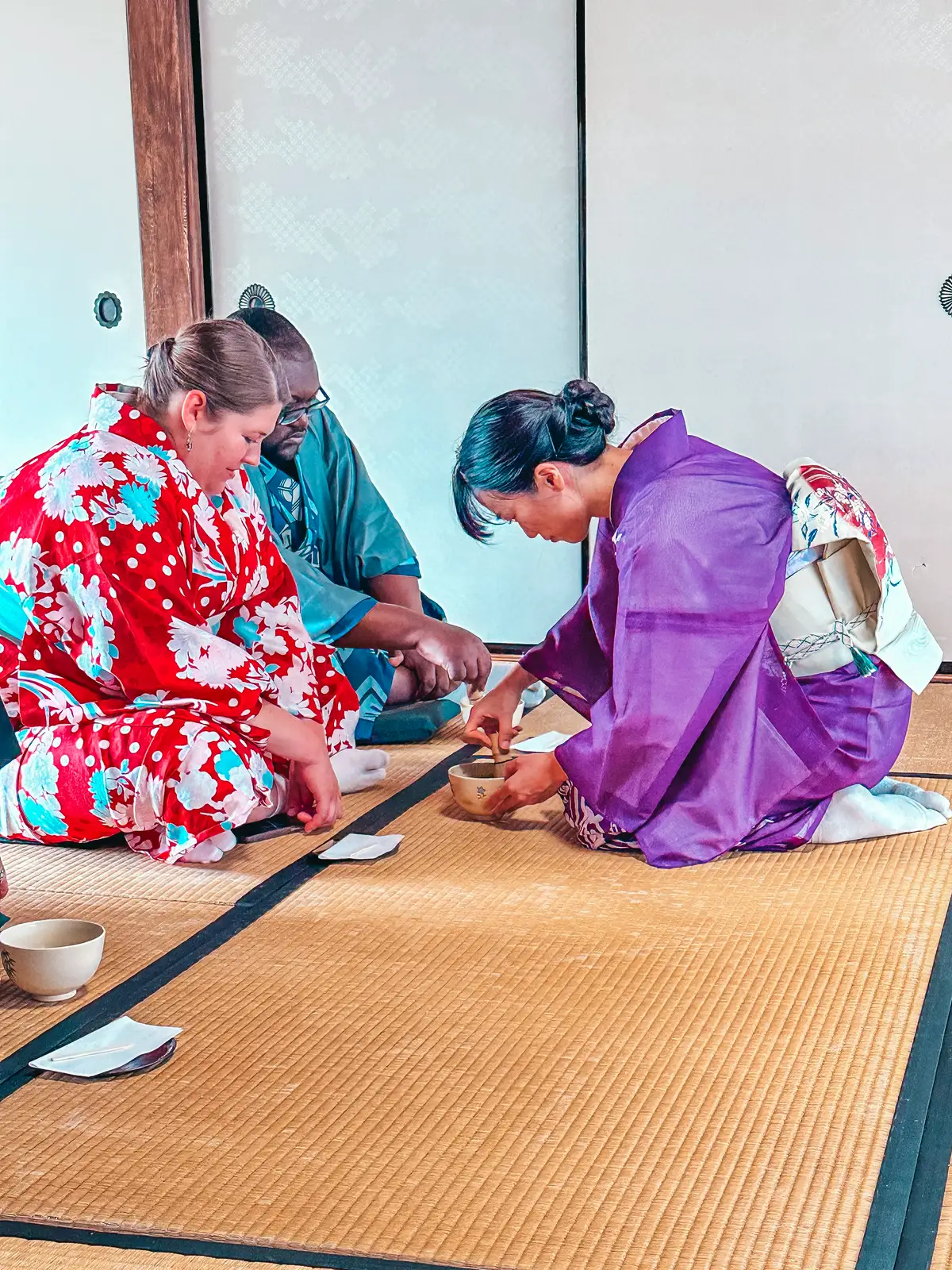 Making matcha at a traditional tea ceremony in Kyoto