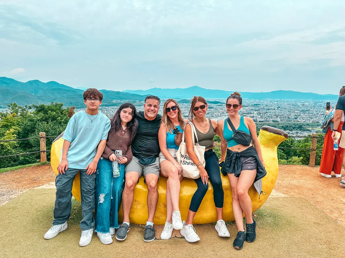 Group of friends at the top of Arashiyama Monkey Park Iwatayama