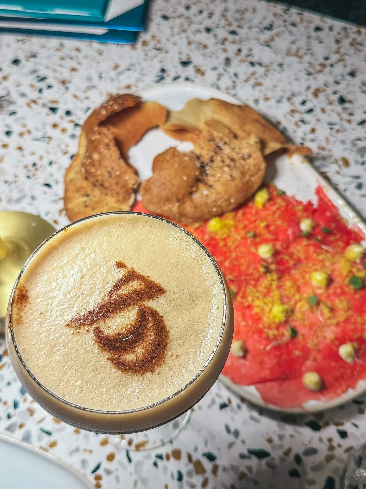 Espresso martini and beef carpaccio from Juno & the Peacock on Beach Drive in St Pete